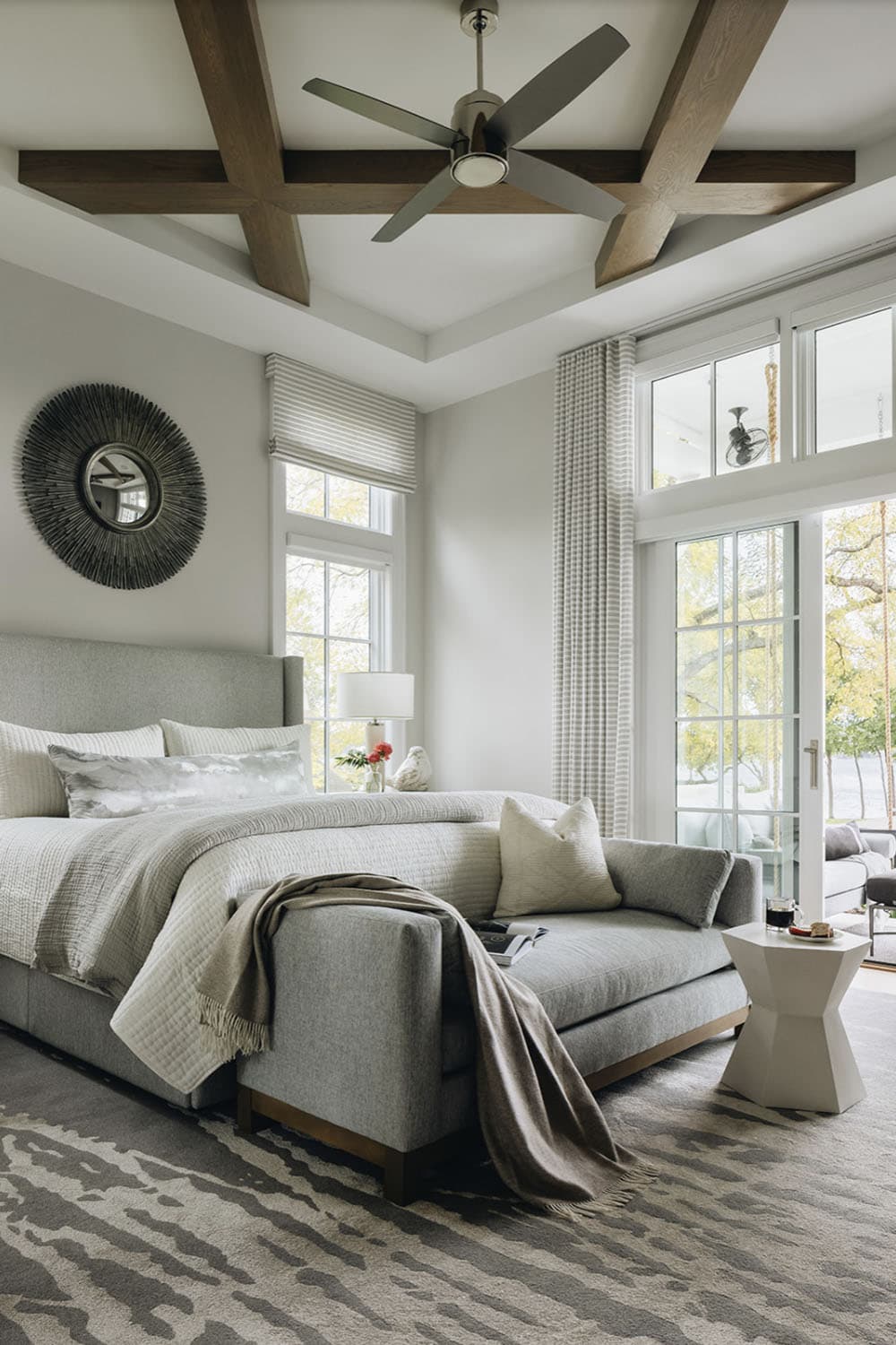 transitional bedroom with sliding glass doors