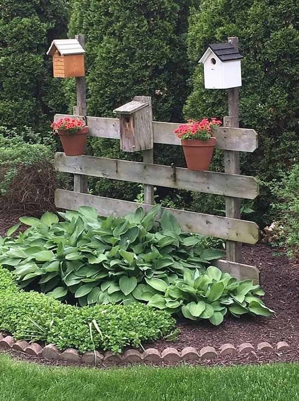 corner garden with a fence