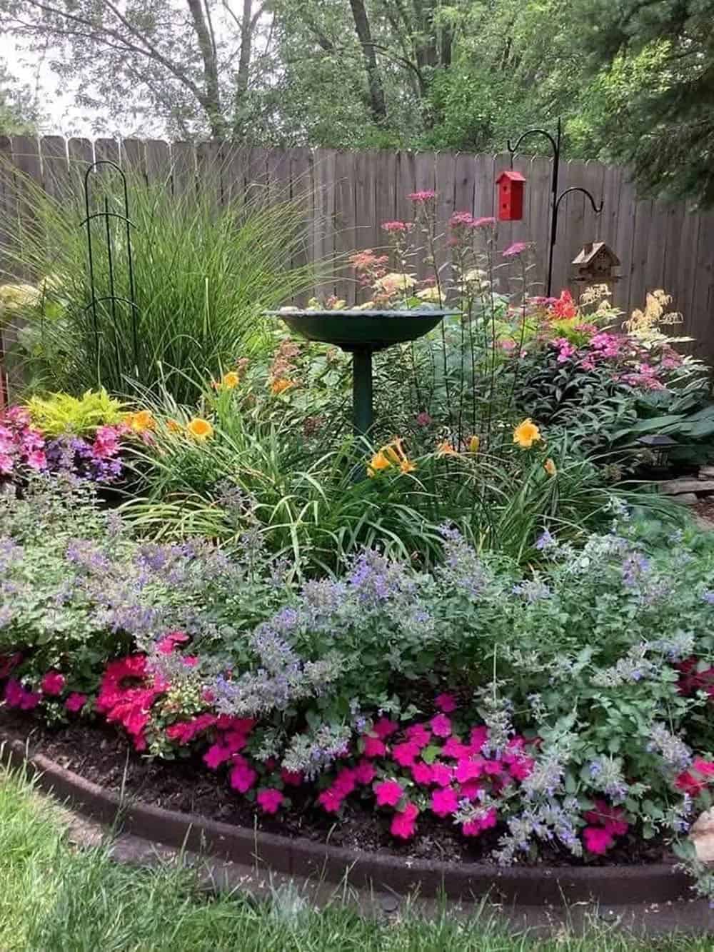 corner garden with a bird bath