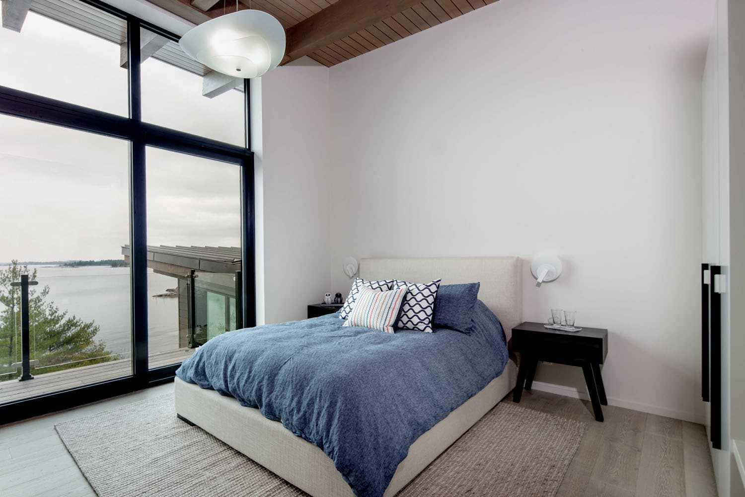 modern bedroom with a large window