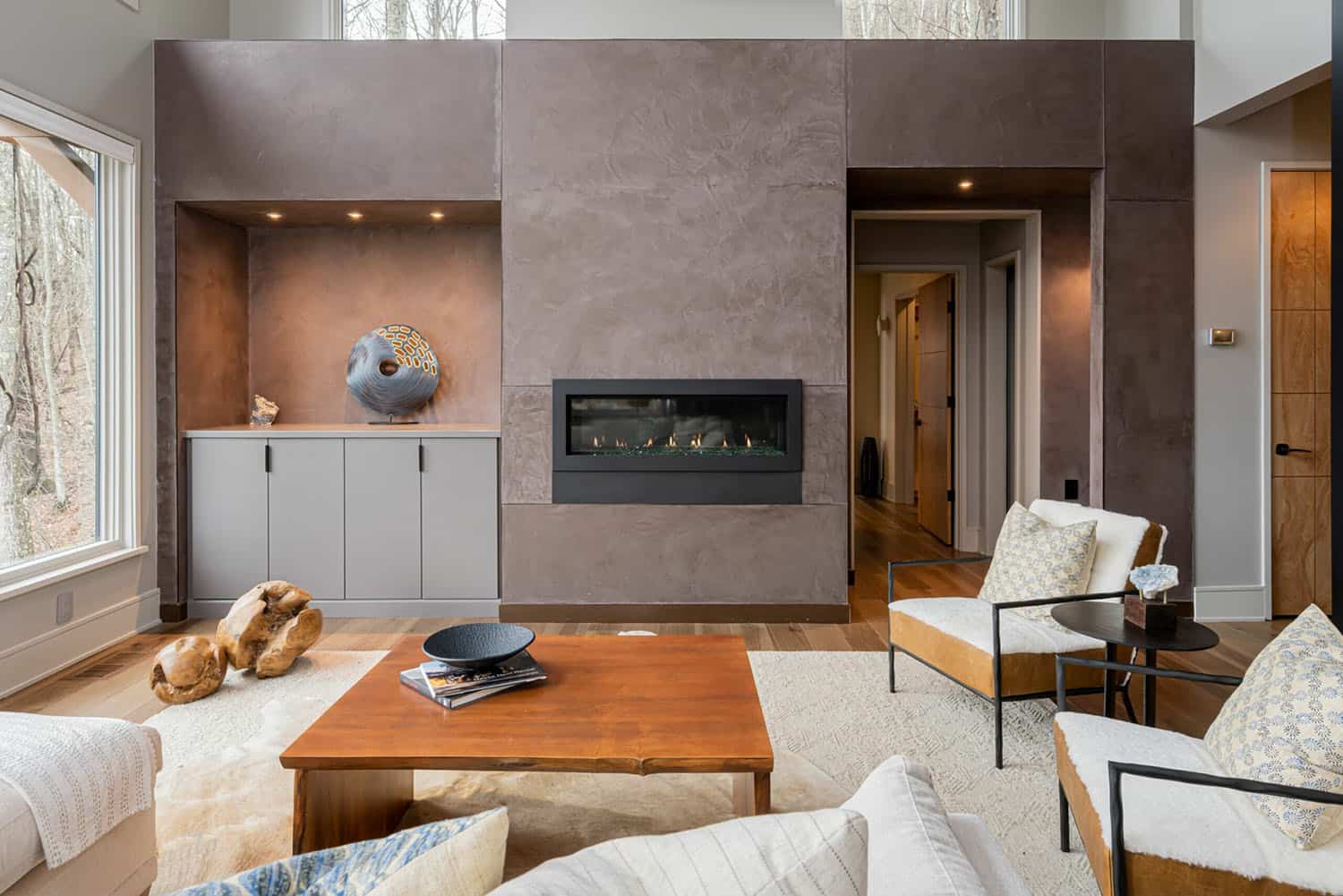 contemporary living room with a fireplace