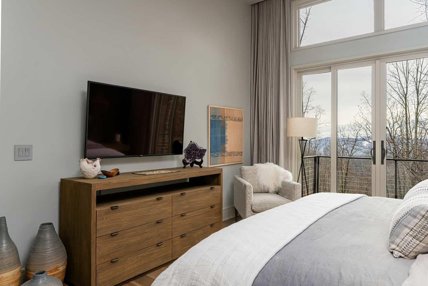 contemporary bedroom with a dresser