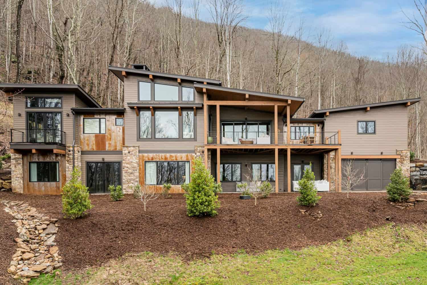 contemporary mountain home exterior backyard view