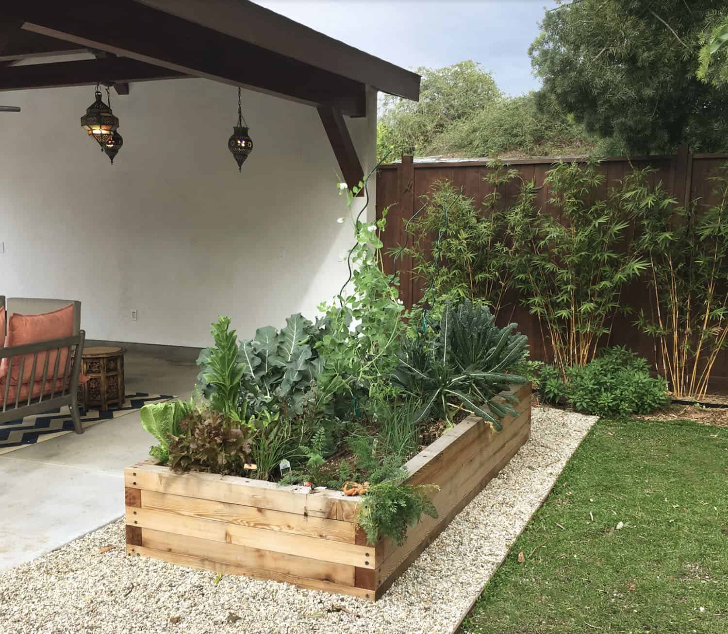 raised cedar planter with vegetables