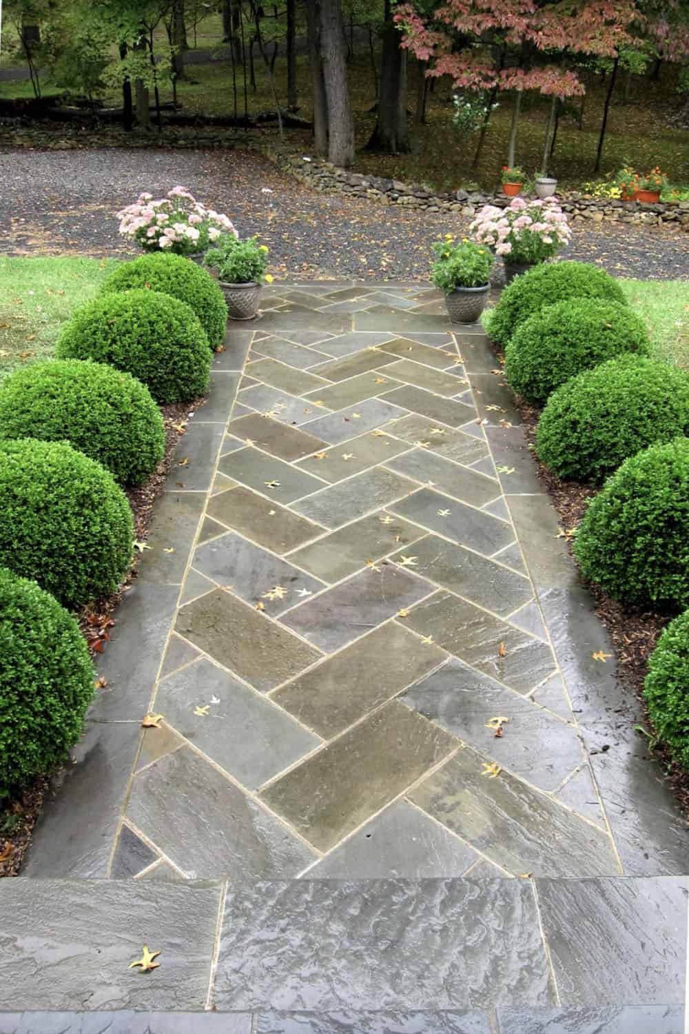 flagstone walkway in a herringbone pattern
