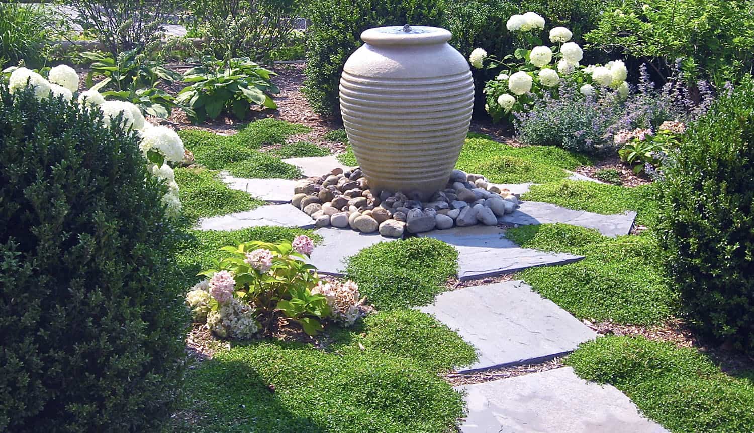 garden path with a water fountain