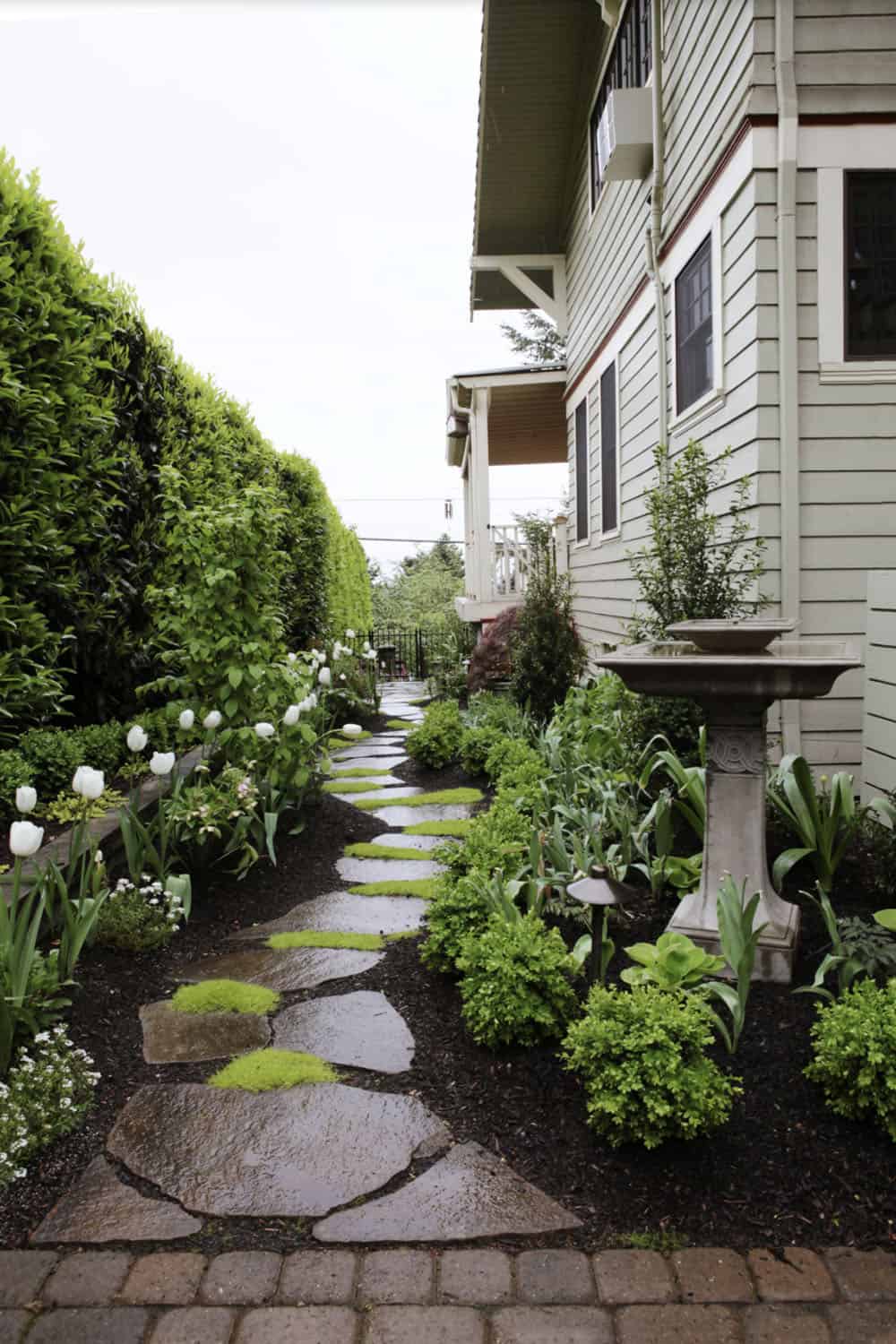side yard with a flagstone pathway