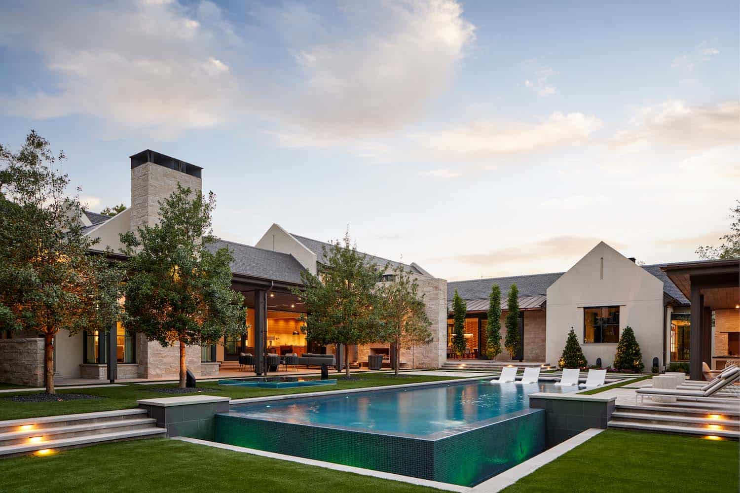 contemporary home exterior with a pool