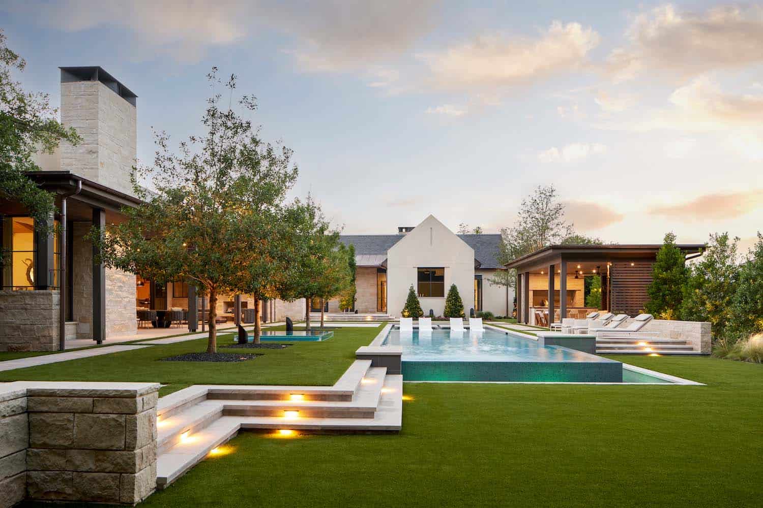contemporary home exterior landscape with a pool