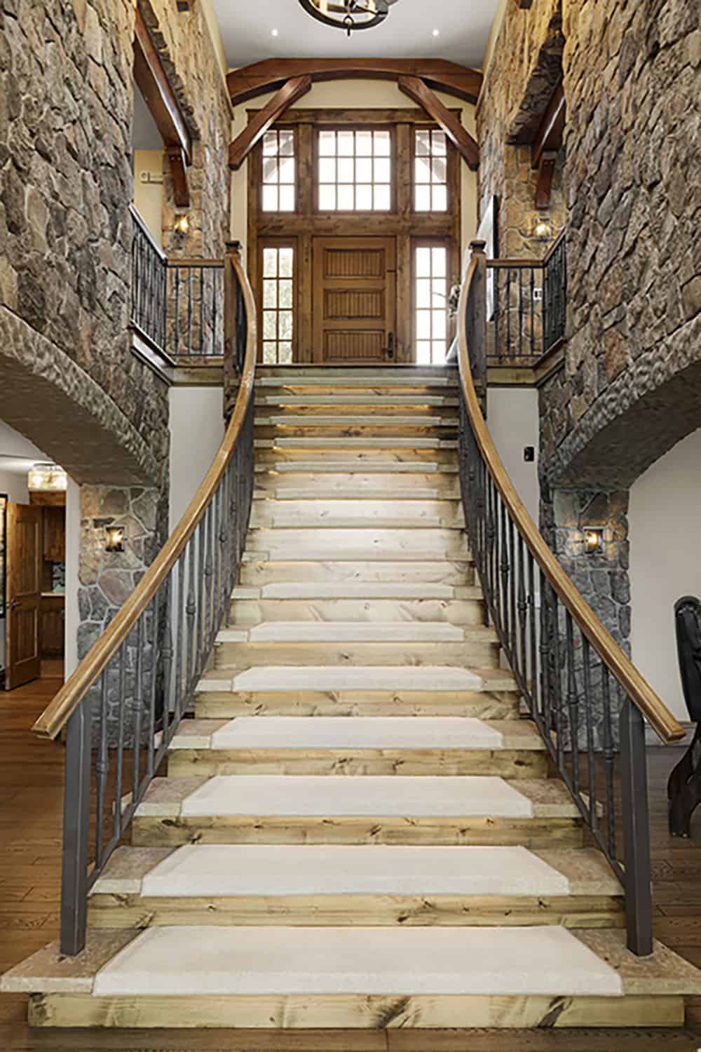 rustic front entry with natural stone walls