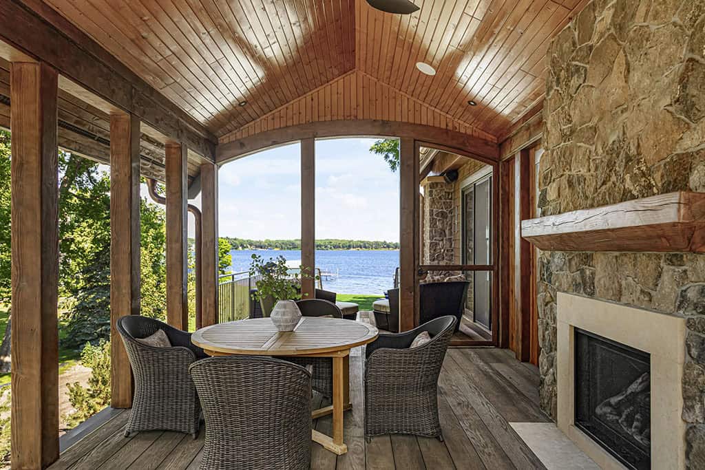 rustic covered porch with outdoor furniture 