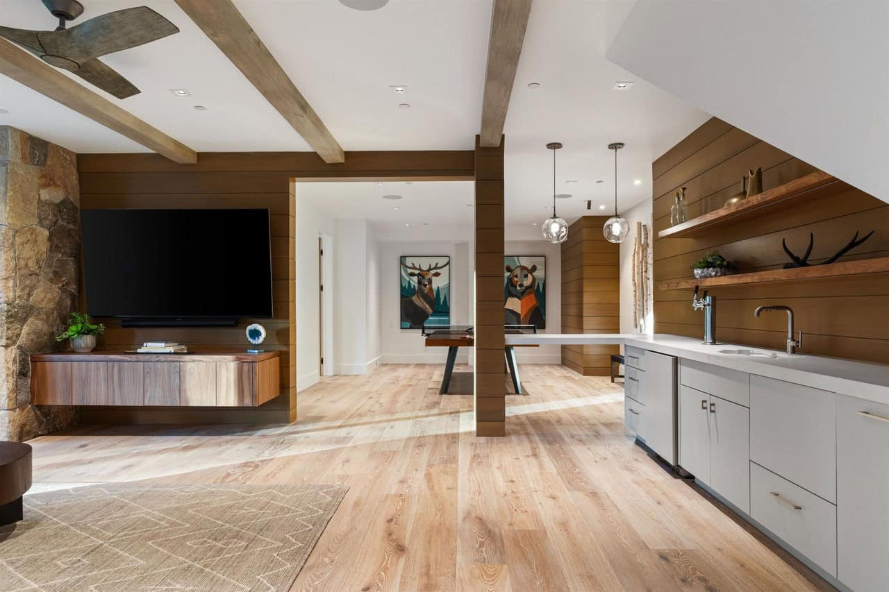 contemporary family room with a home bar
