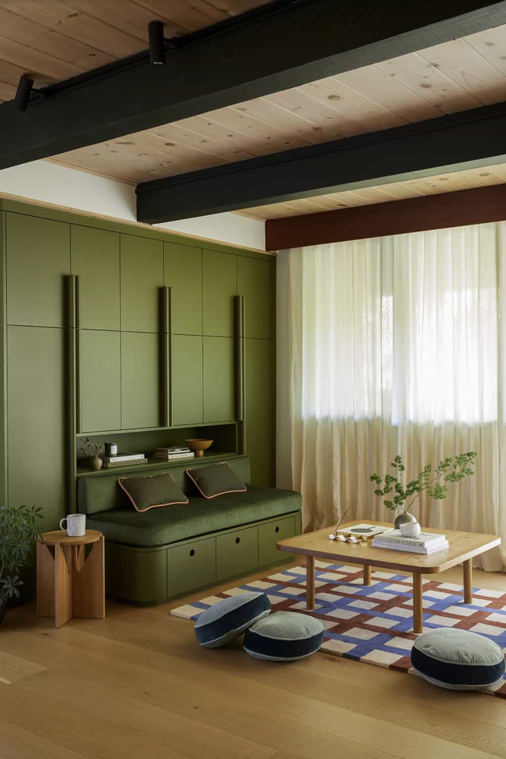 Midcentury Family Room with Green Cabinets