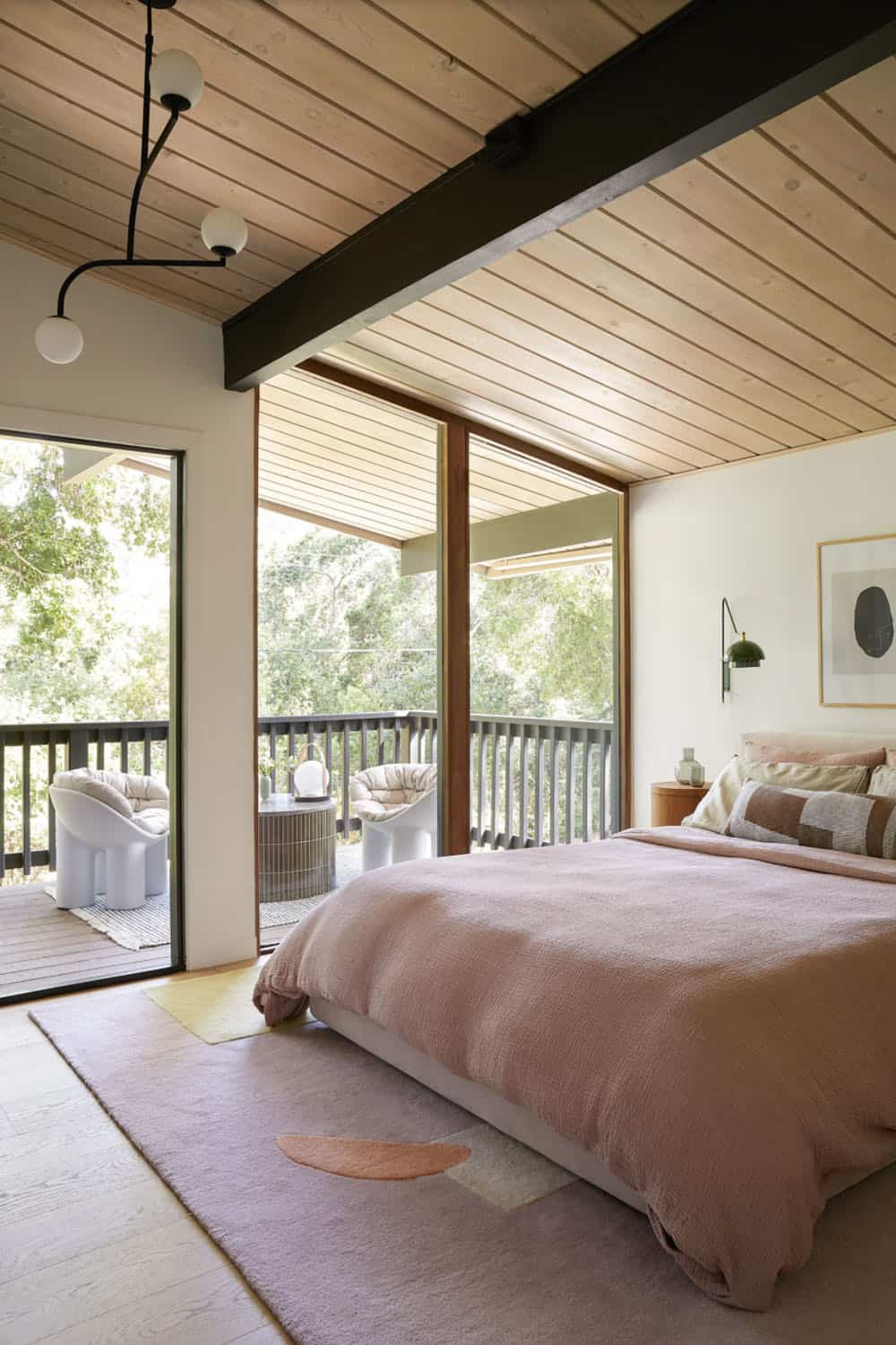 Midcentury Bedroom with a Large Window and Private Patio