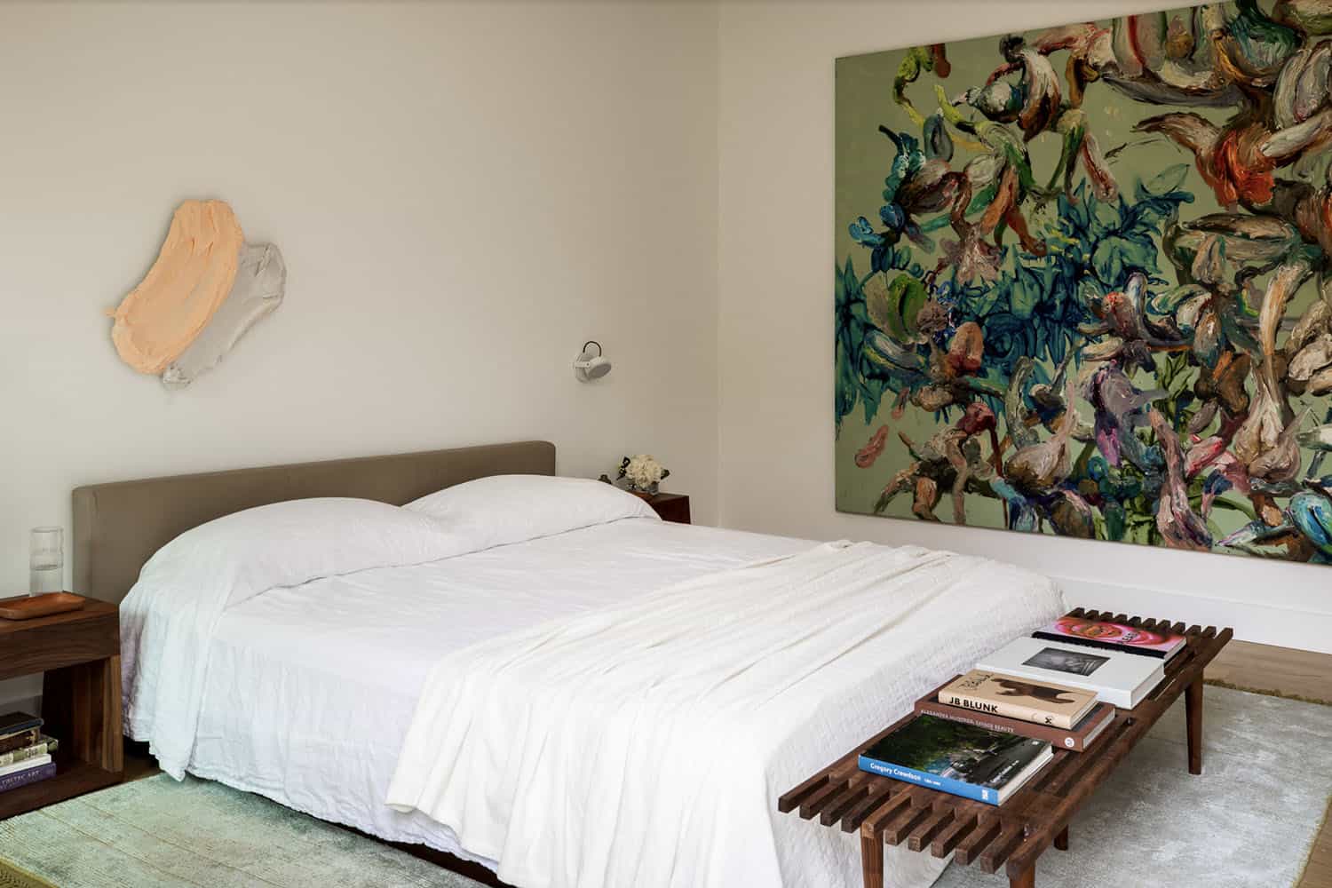 midcentury modern bedroom with a painting on the wall