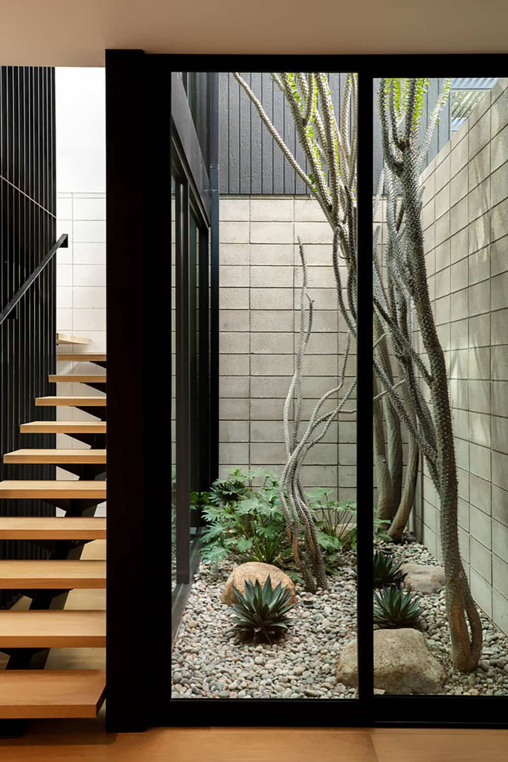 midcentury modern atrium and staircase