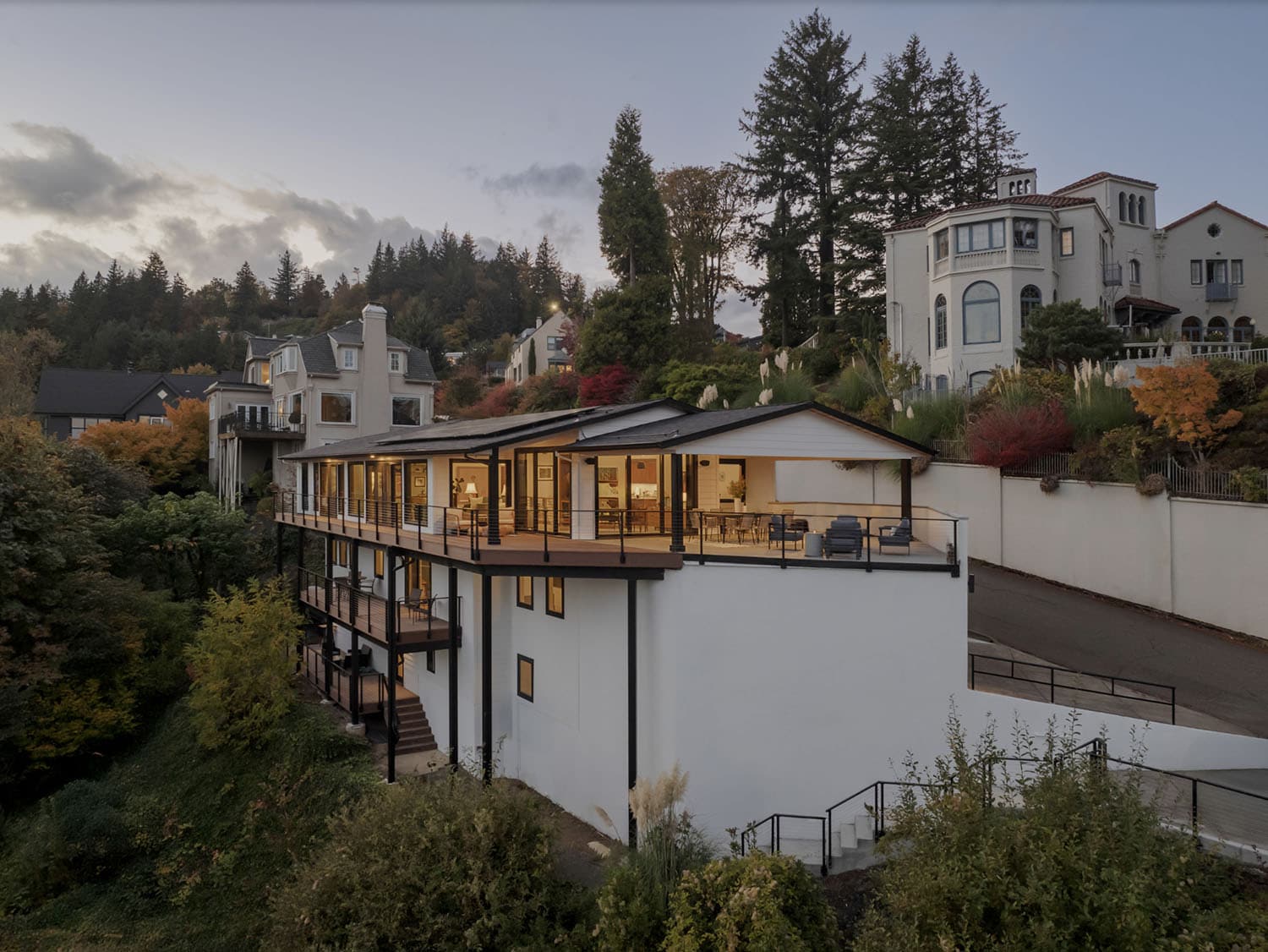 midcentury modern home exterior at dusk