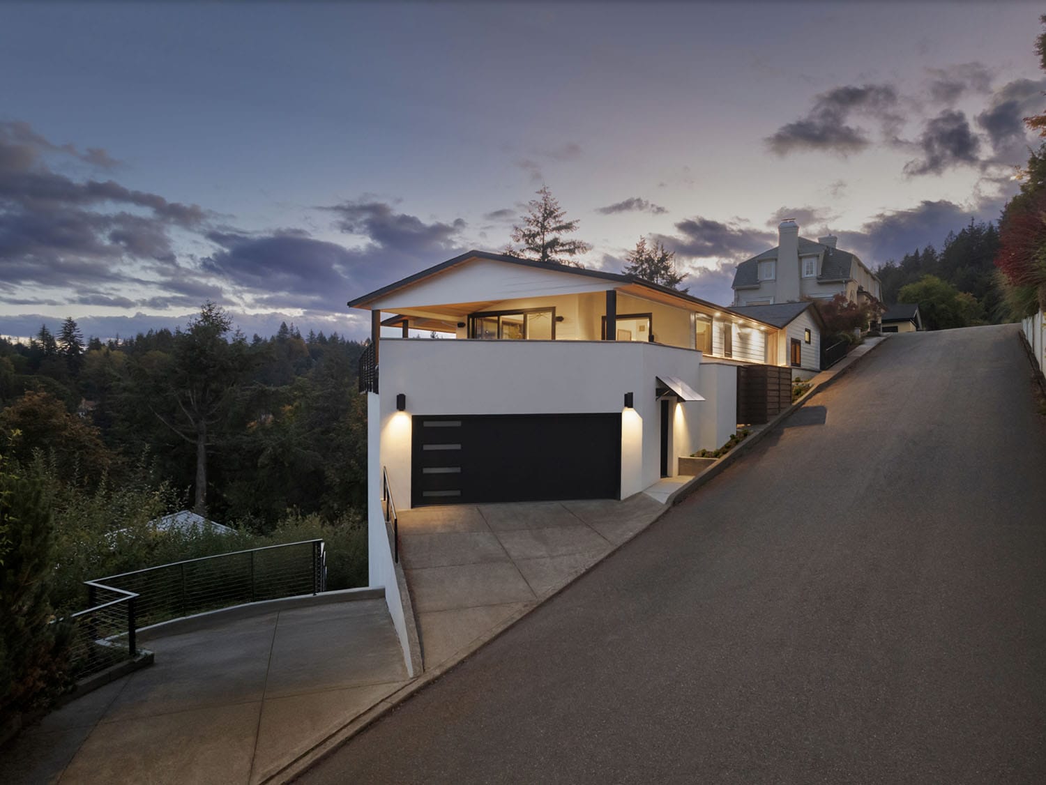 midcentury modern home exterior at dusk