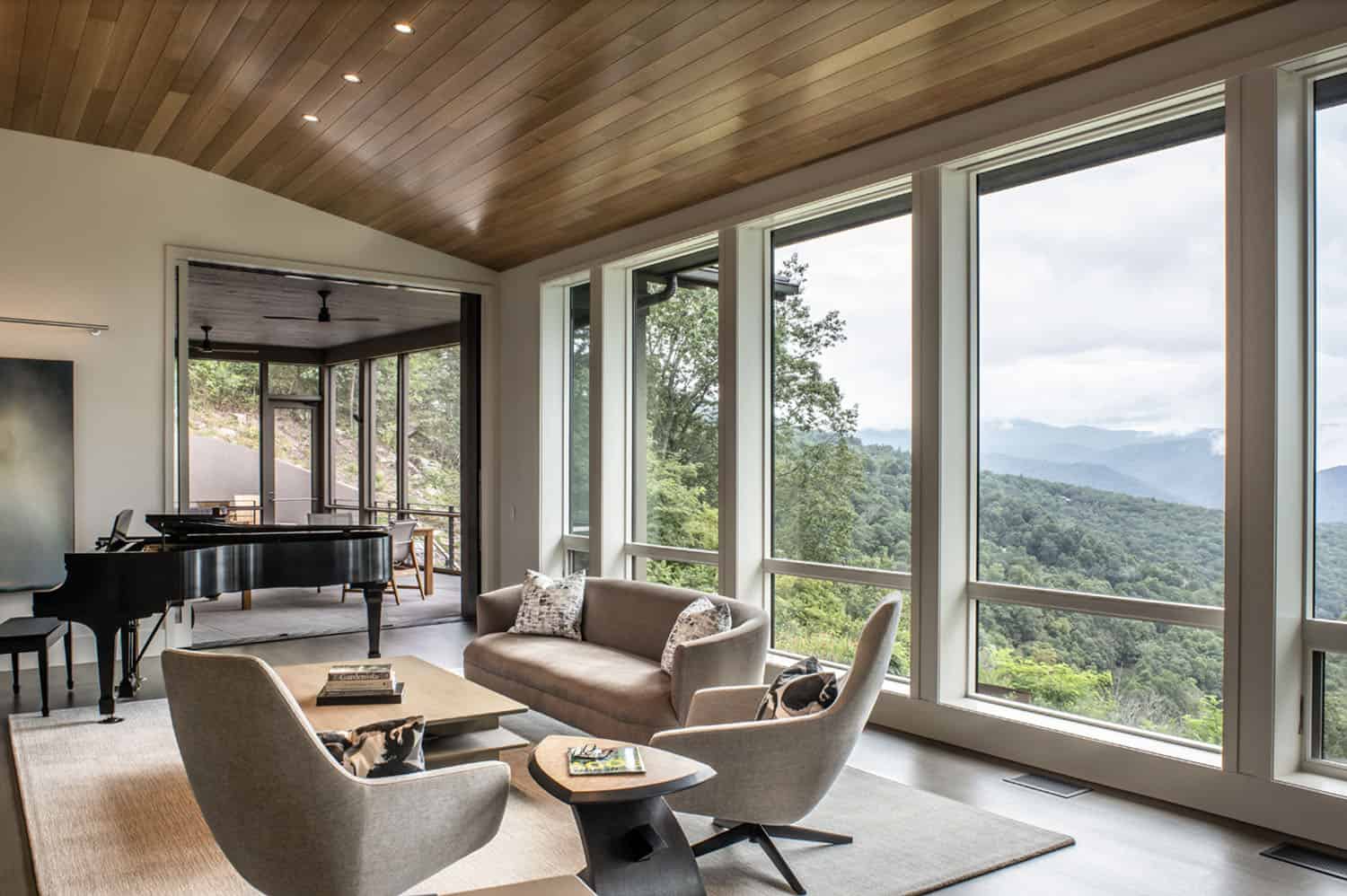 rustic modern living room with large windows