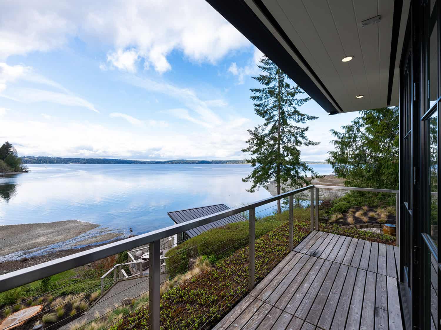 modern waterfront home private balcony