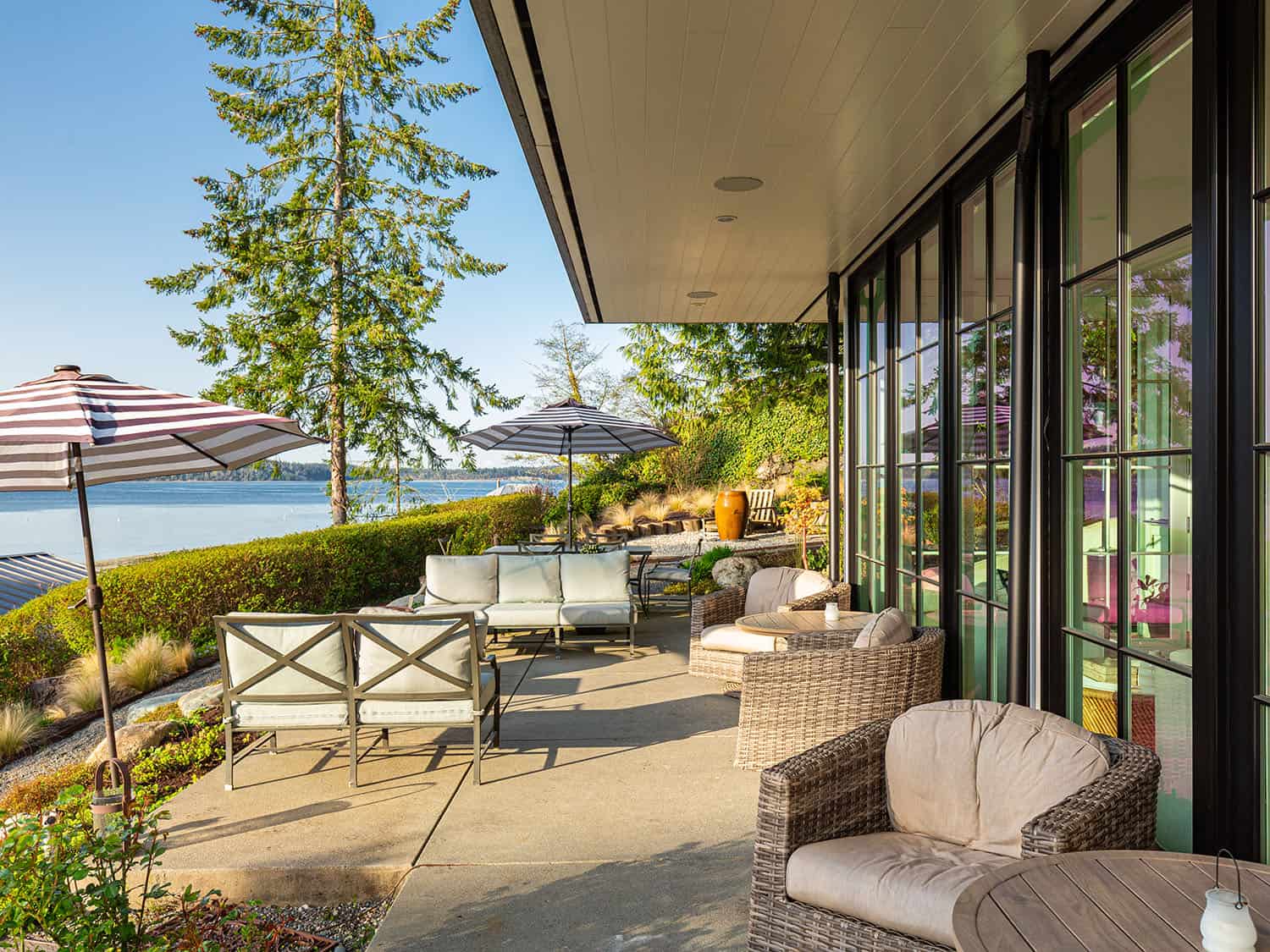 modern waterfront home patio