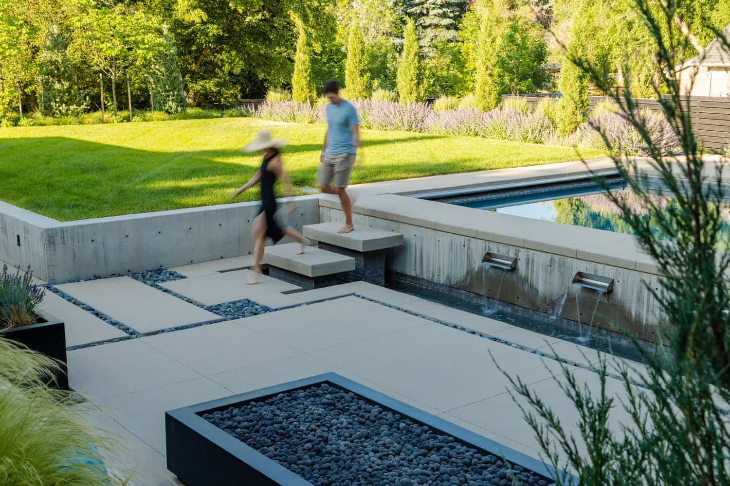modern house exterior patio with a firepit