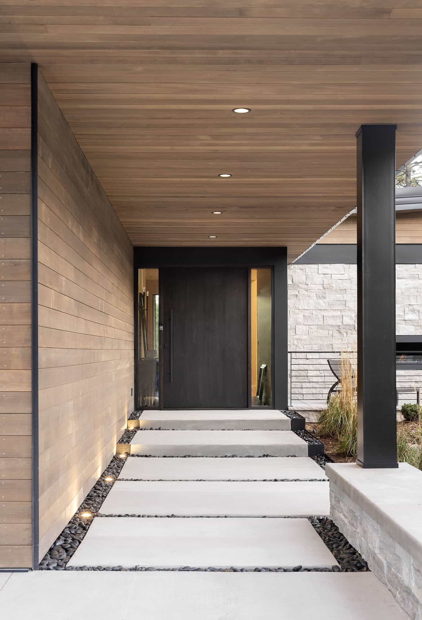 modern mountain home covered exterior entry