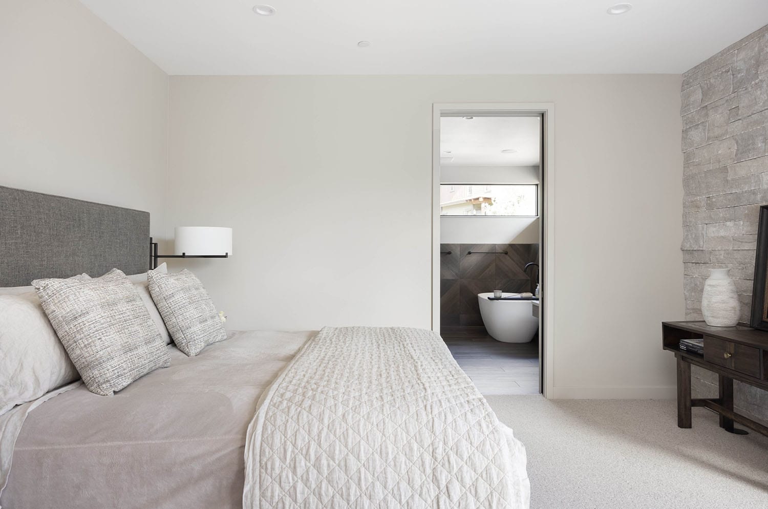modern bedroom with an en-suite bathroom