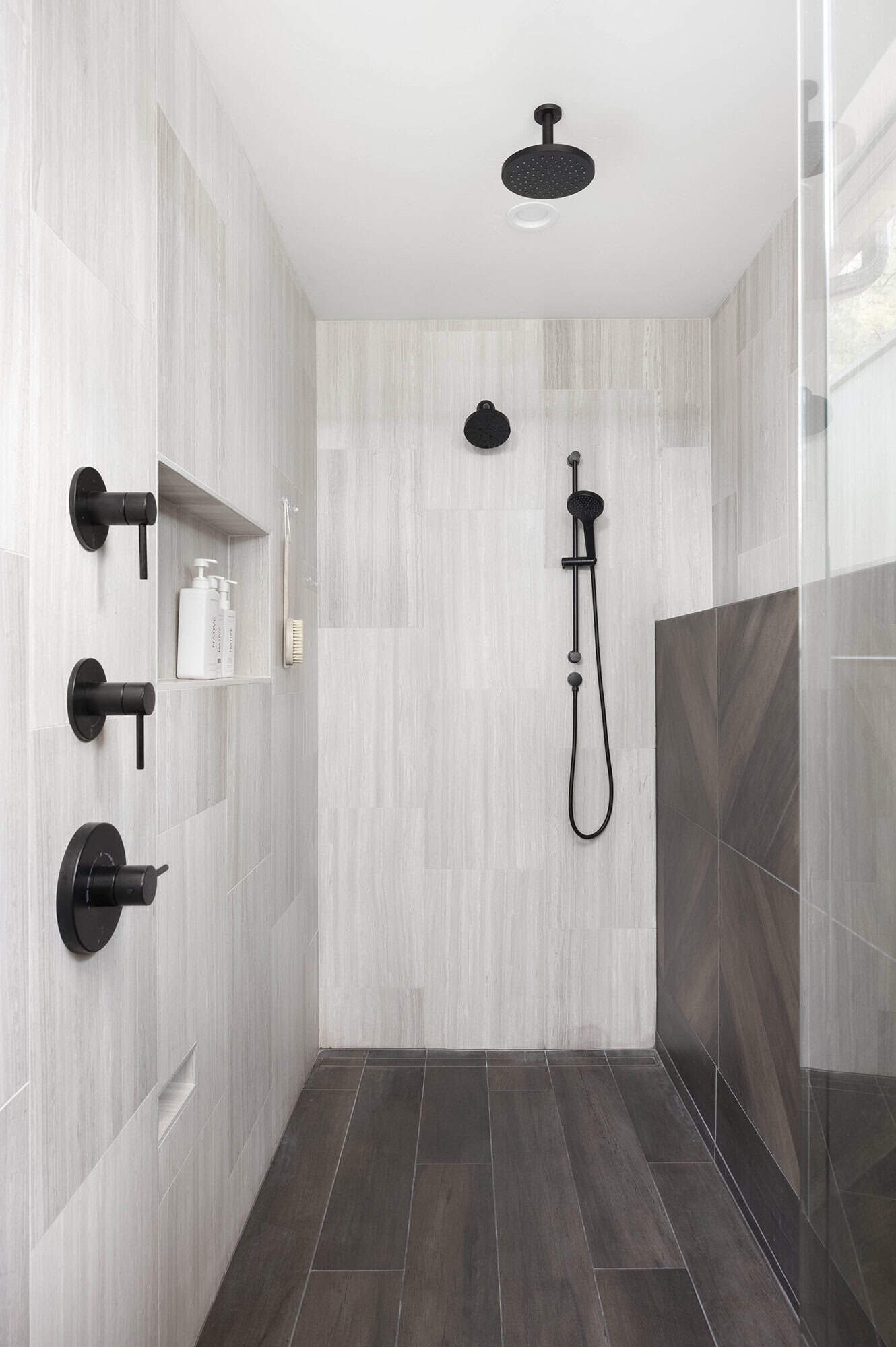 modern bathroom shower with white tiles