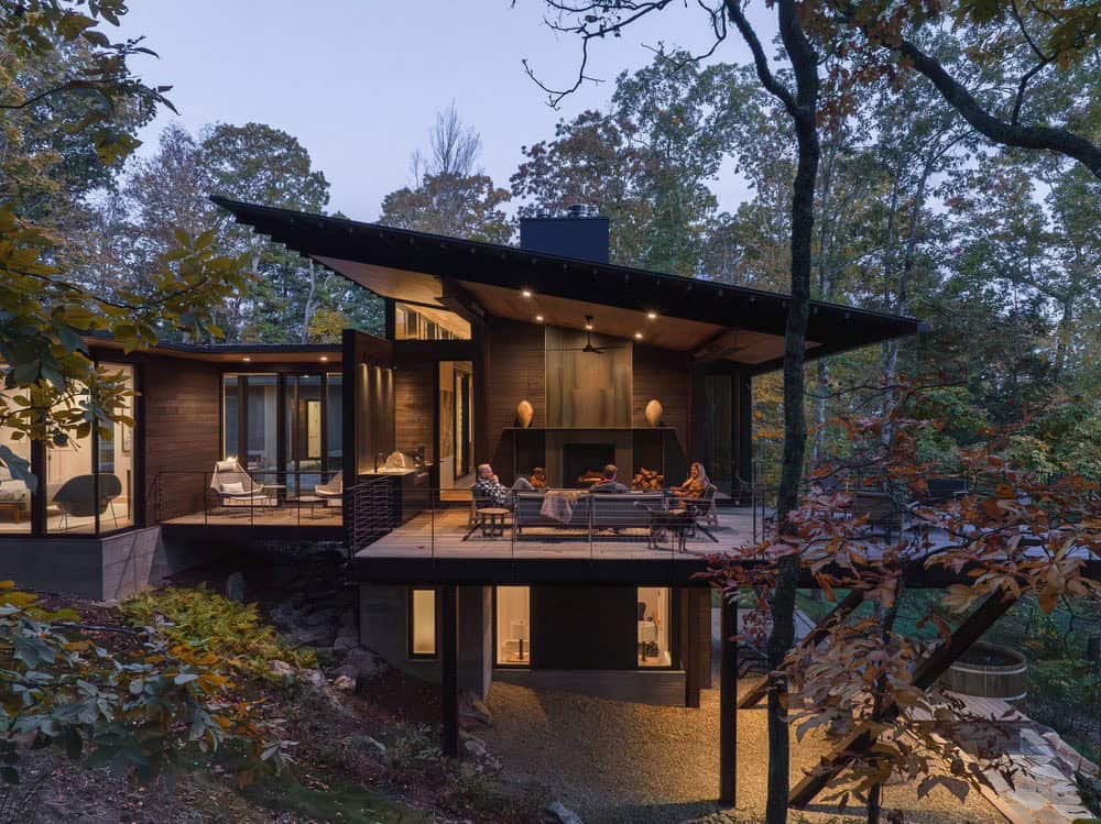 modern mountain house exterior at dusk