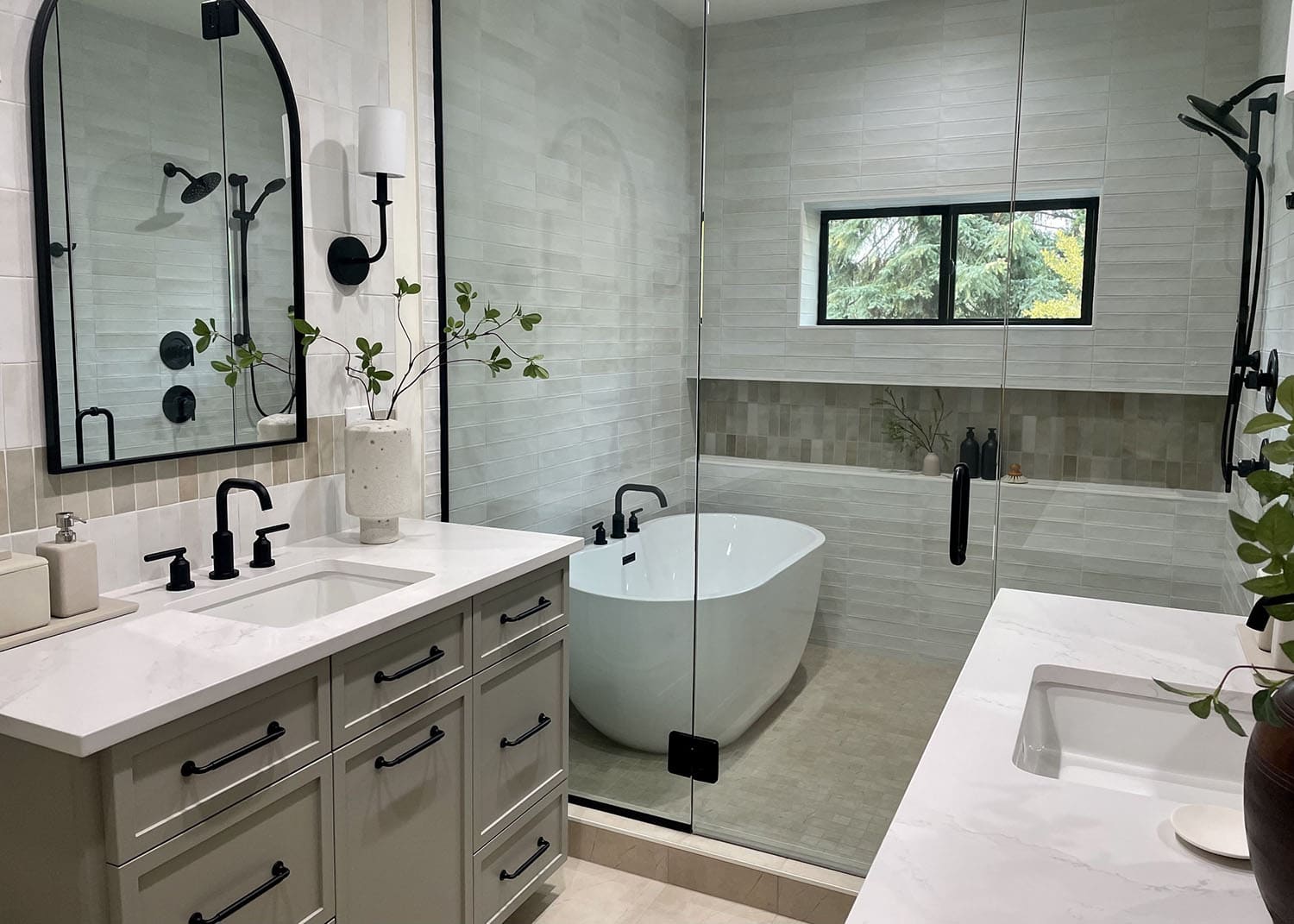 rustic bathroom with split vanities, wet room, and Zellige tile