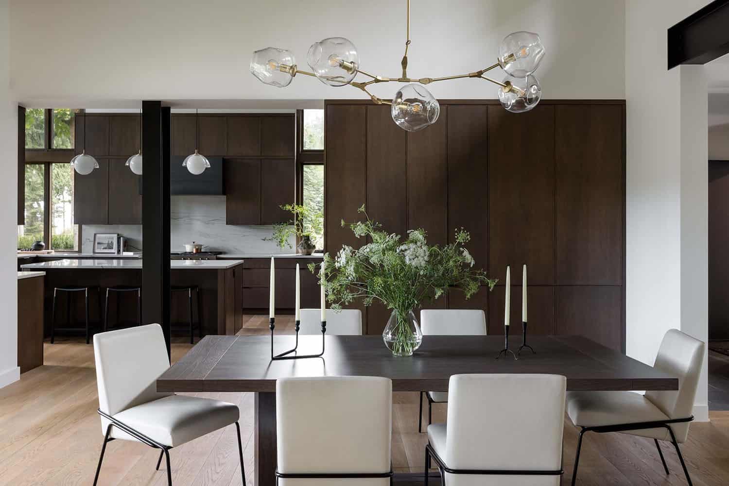 modern dining room with a branching chandelier