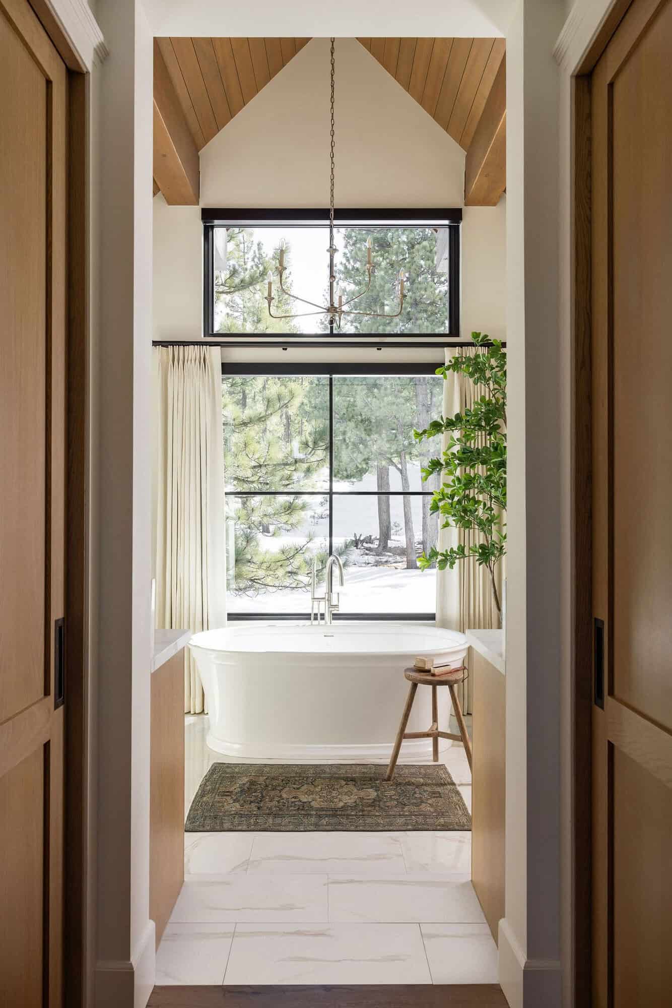 modern farmhouse style bathroom with a freestanding tub