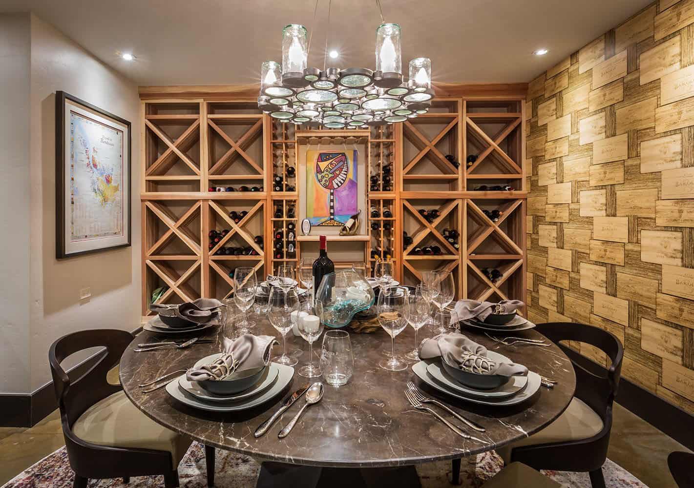 A wine cellar with a dining table and chairs