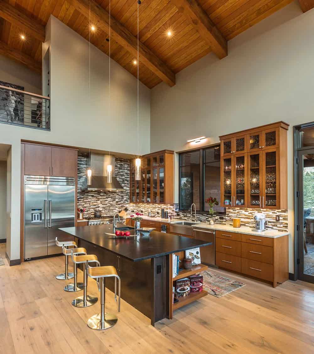 Rustic kitchen with a large island and wooden ceilings