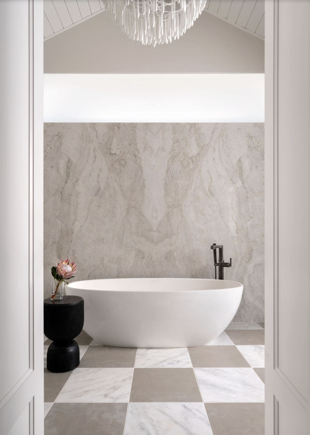 organic modern bathroom with a freestanding tub