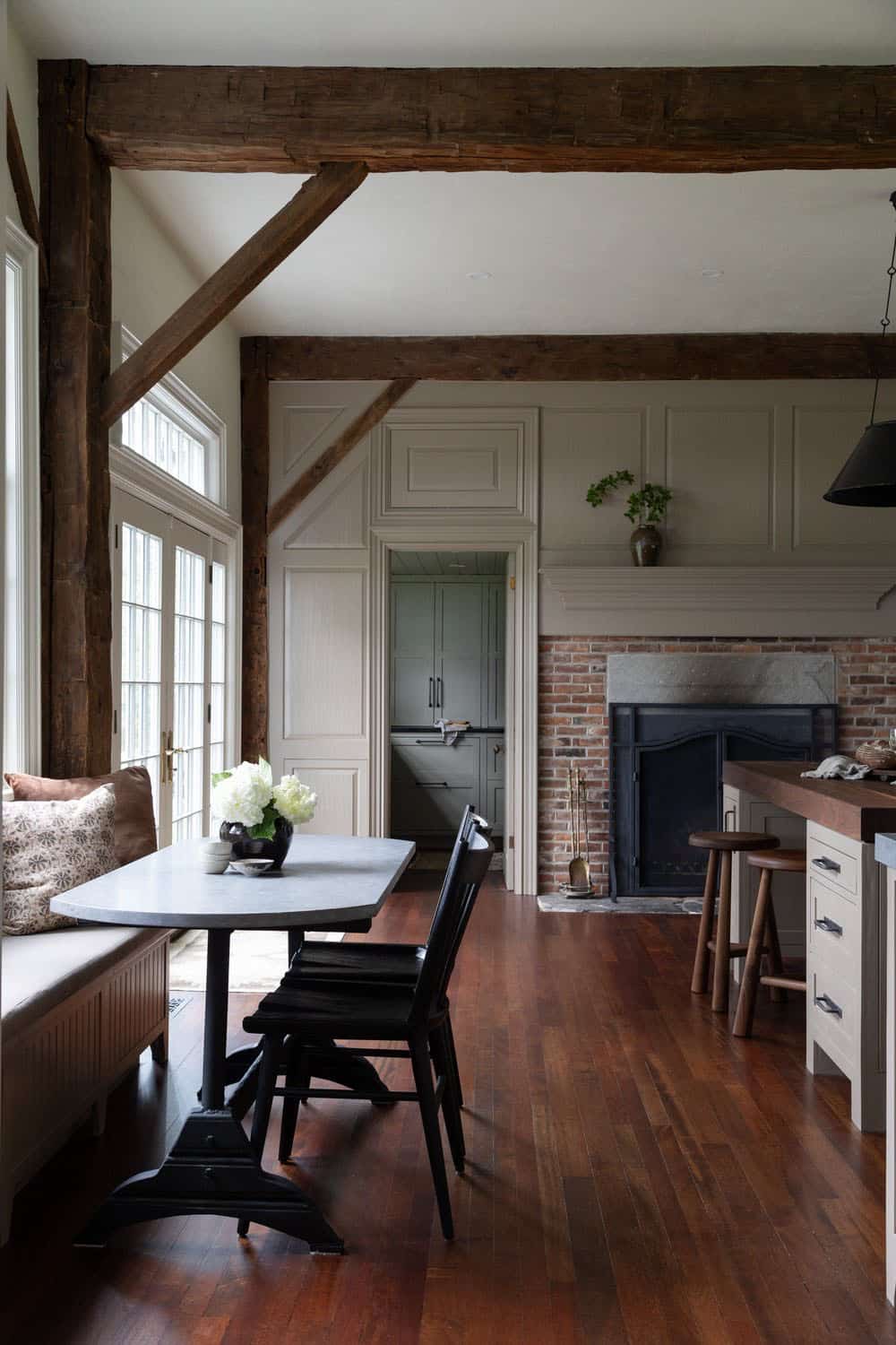 contemporary kitchen and breakfast nook with a banquette