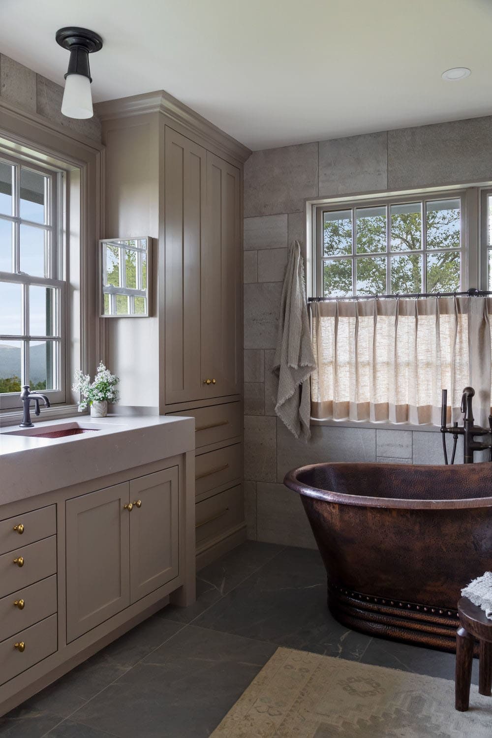 contemporary bathroom with a copper tub
