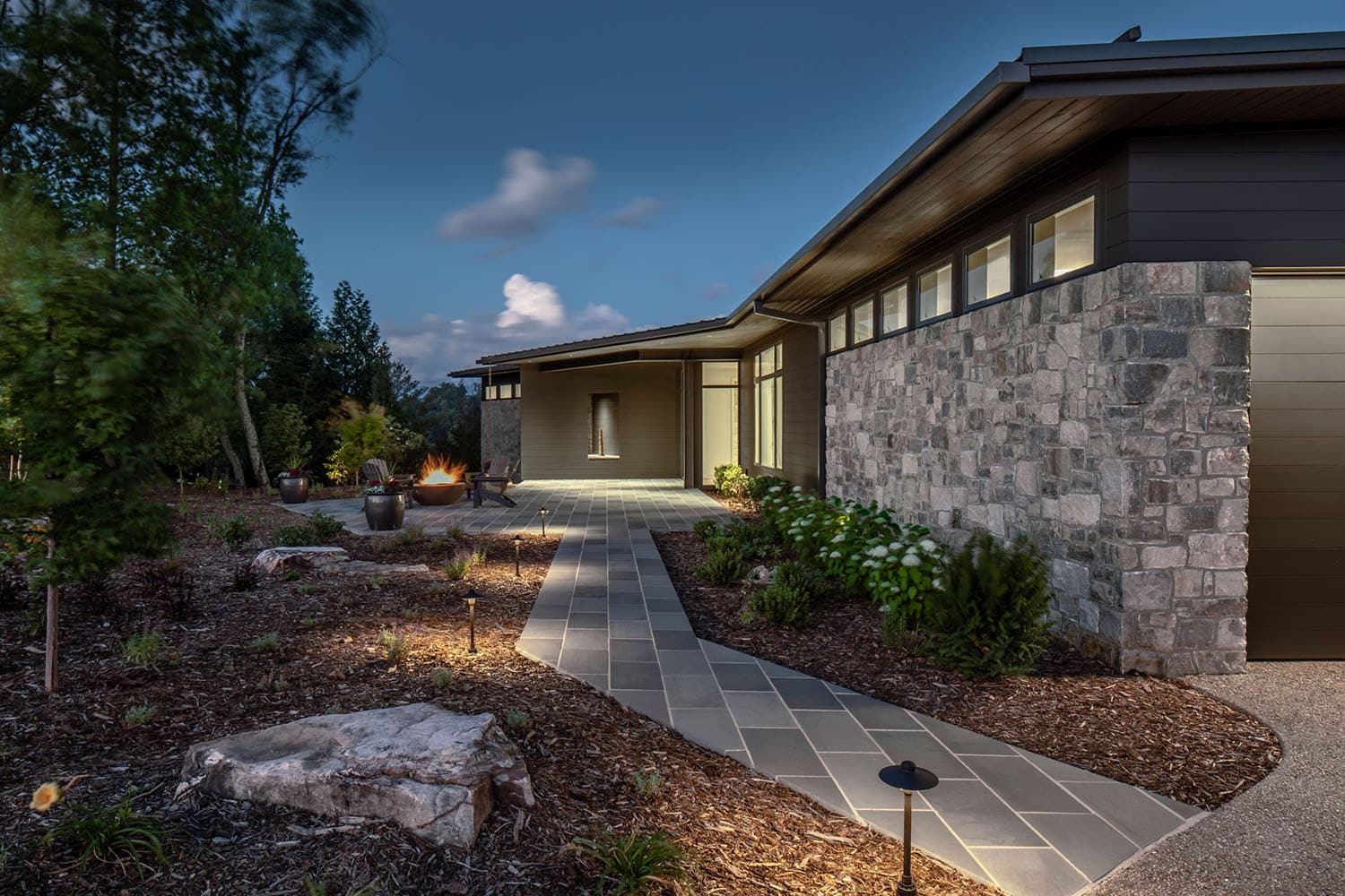 mountain modern home exterior at dusk
