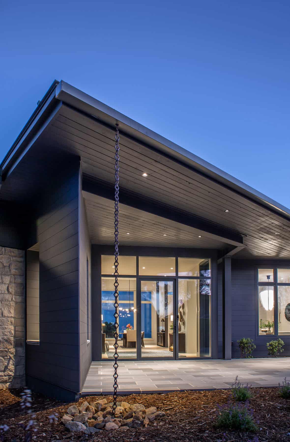 mountain modern home exterior at dusk