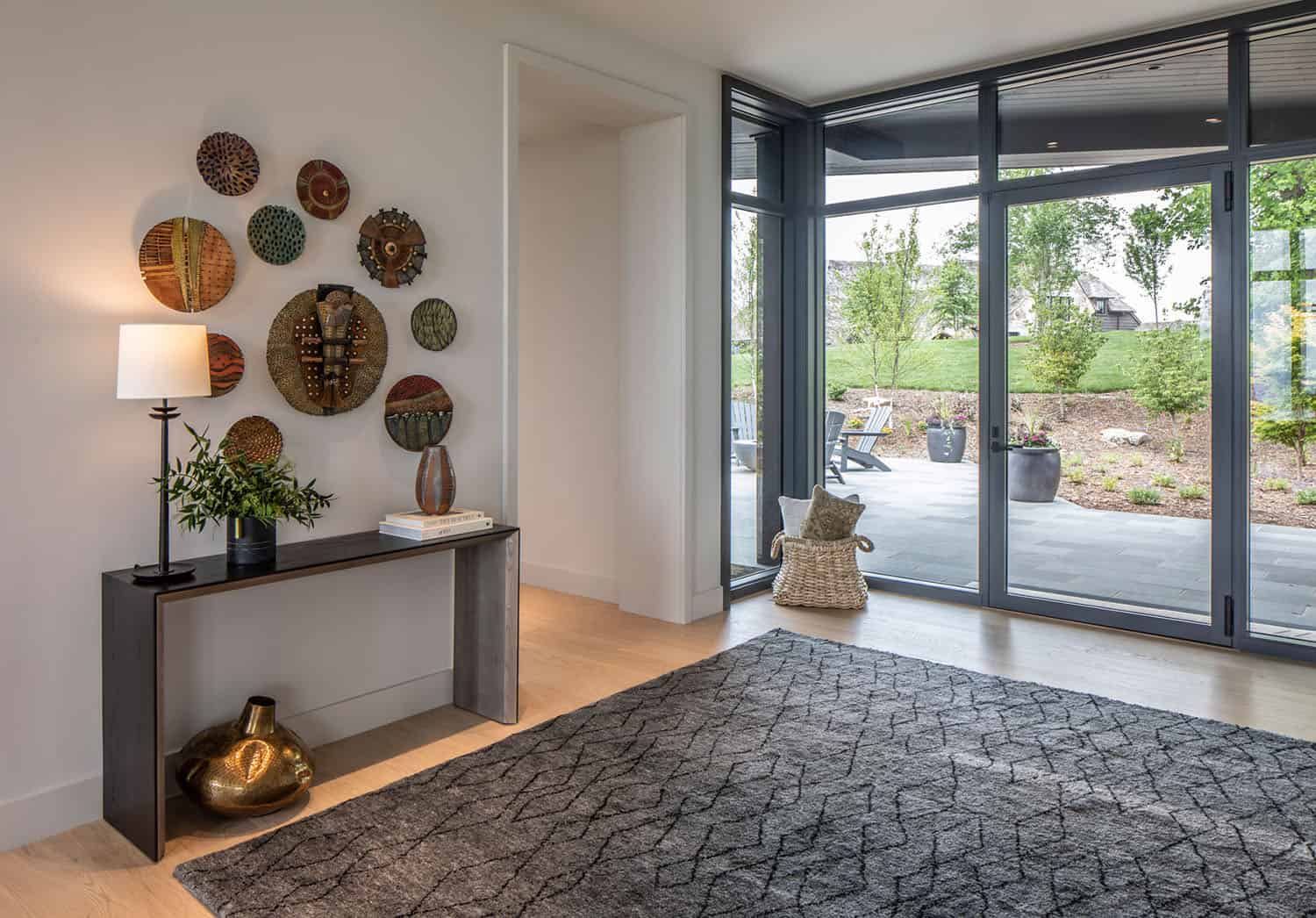 mountain modern home entry with a console table