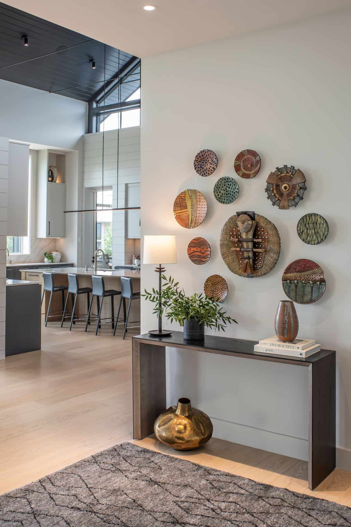 mountain modern home entry with a console table