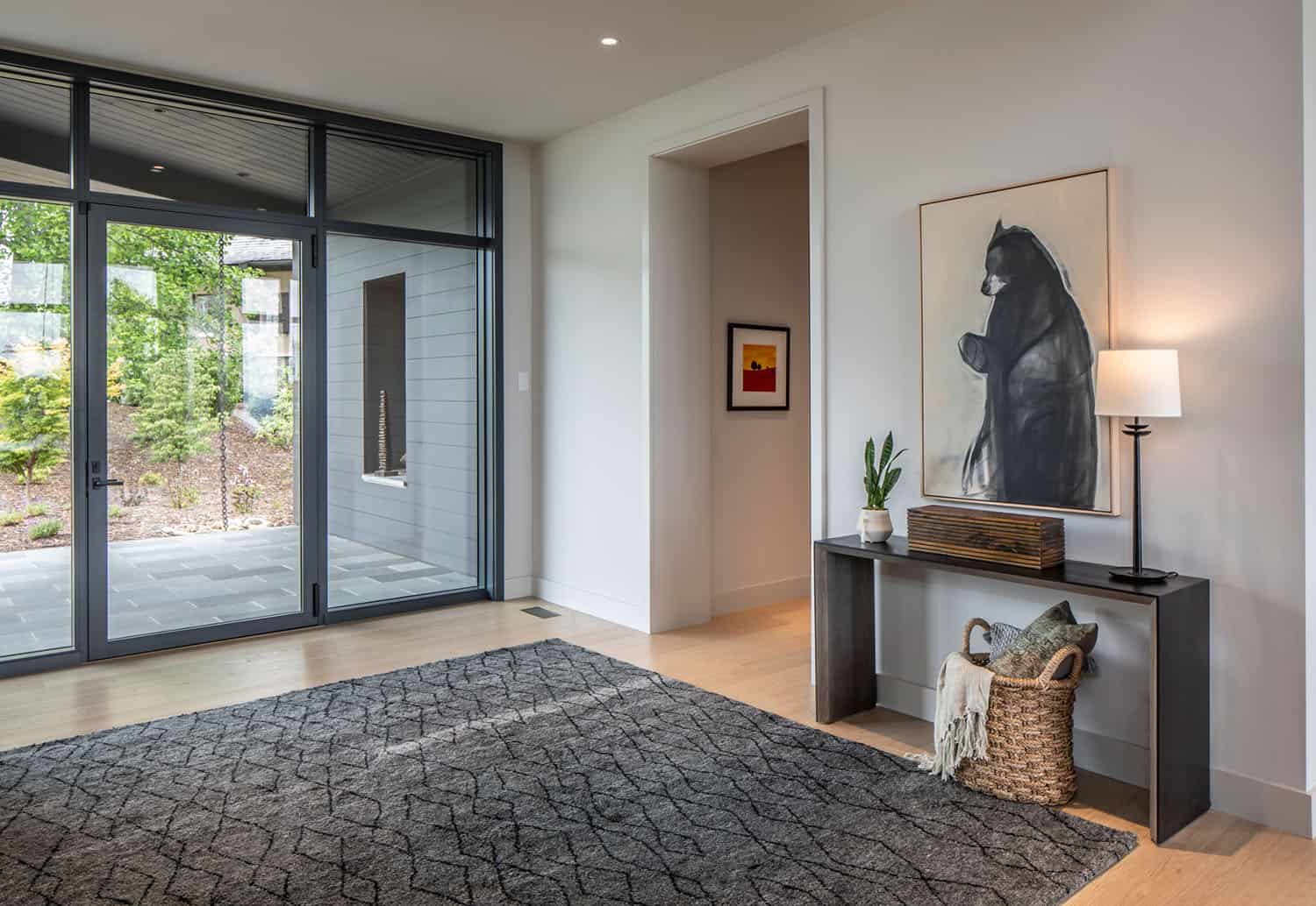 mountain modern home entry with a console table