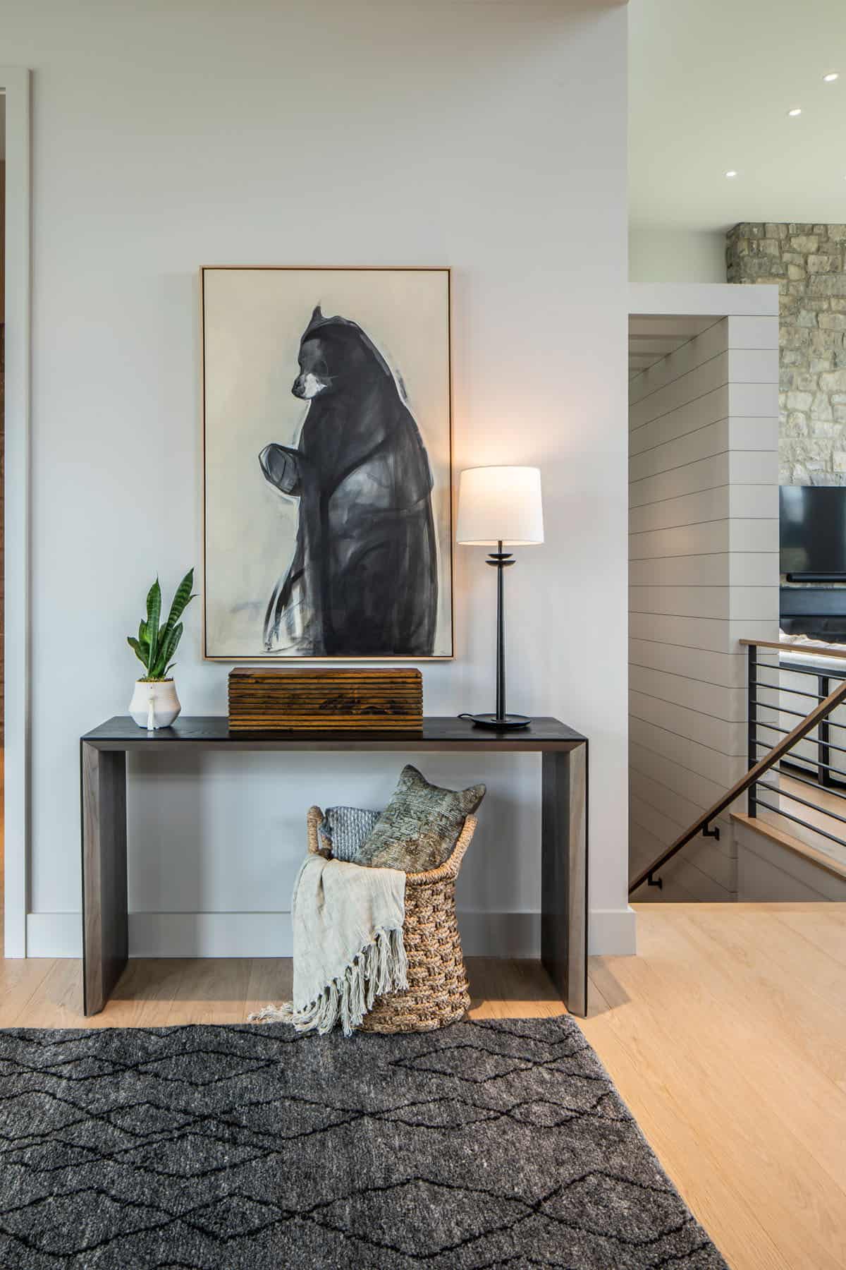 mountain modern home entry with a console table
