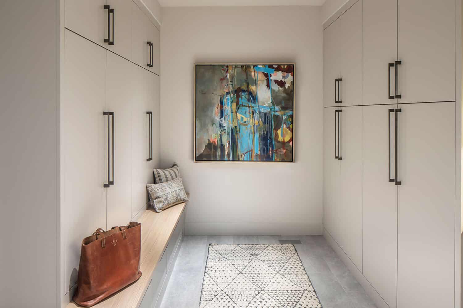 modern mudroom with storage cabinets 