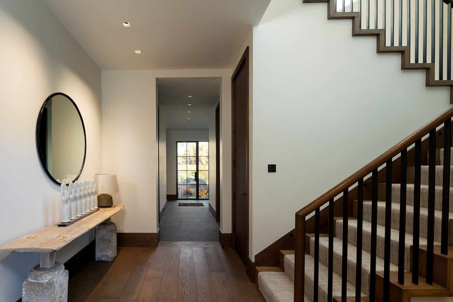 modern mountain home entry with a staircase