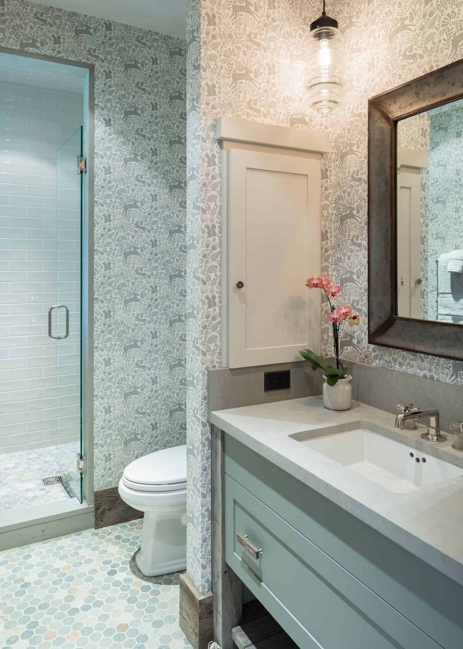 modern bathroom with a sink, toilet and shower