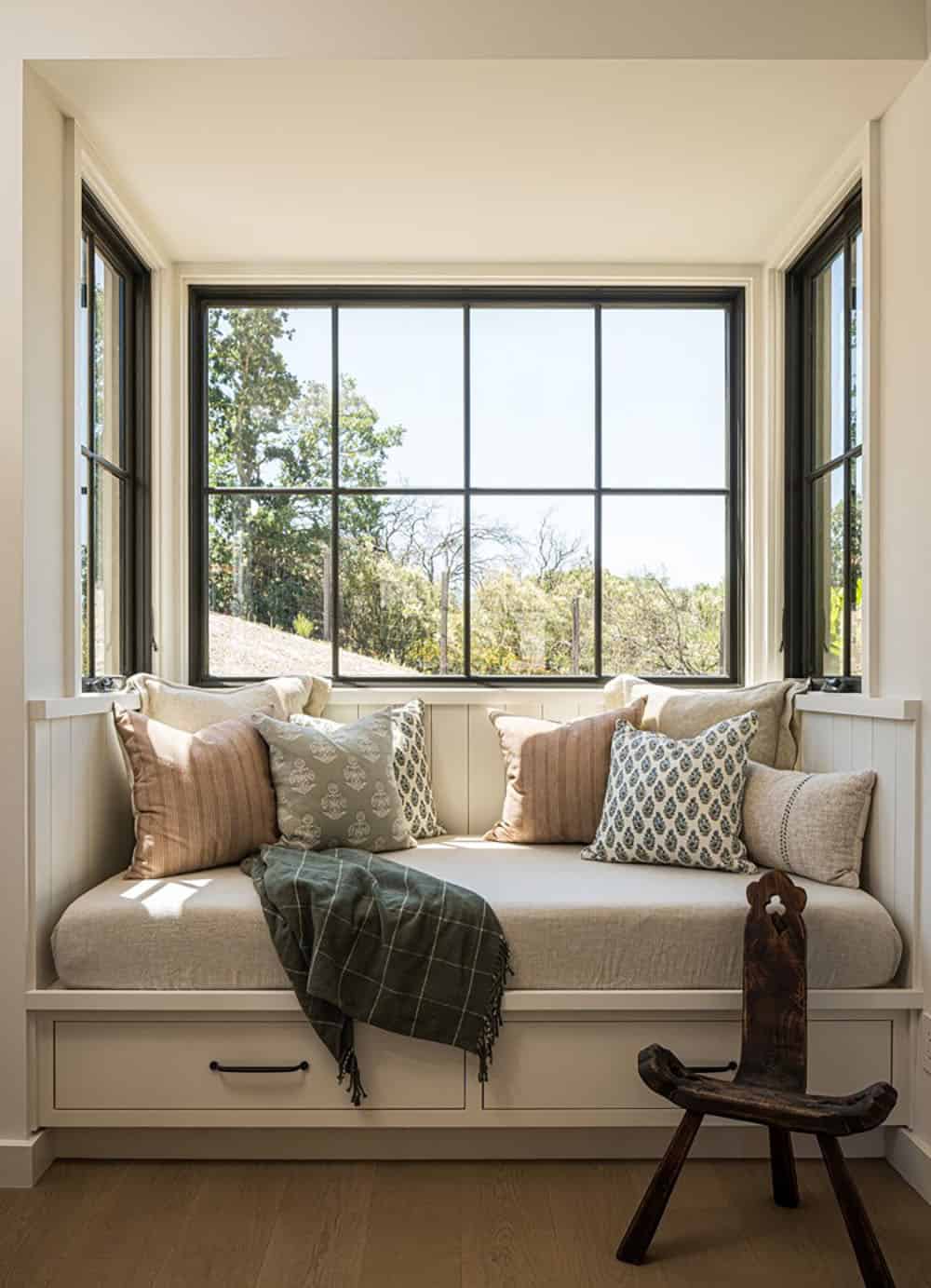 contemporary bedroom with a built-in window seat
