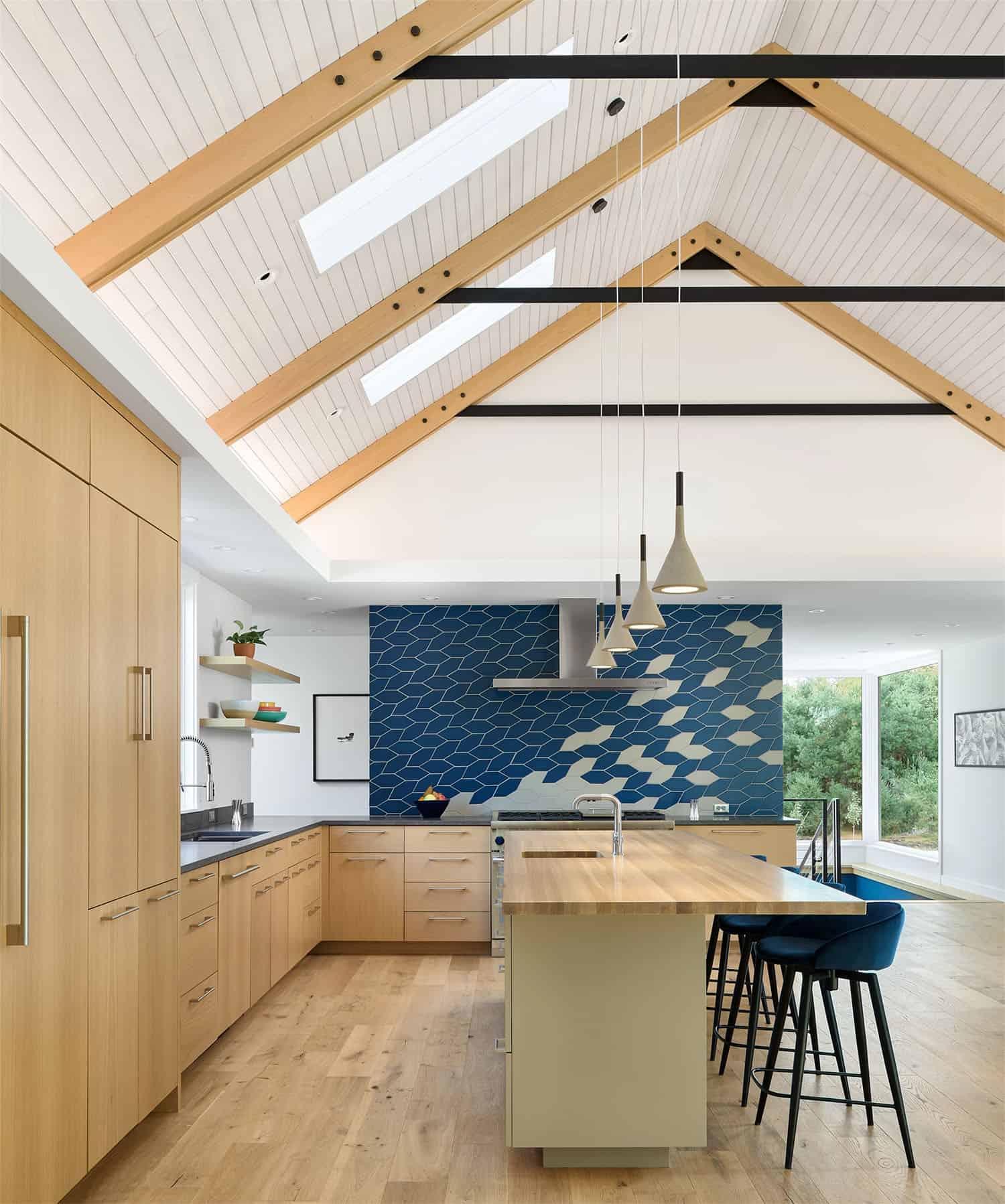 modern kitchen with a vaulted ceiling