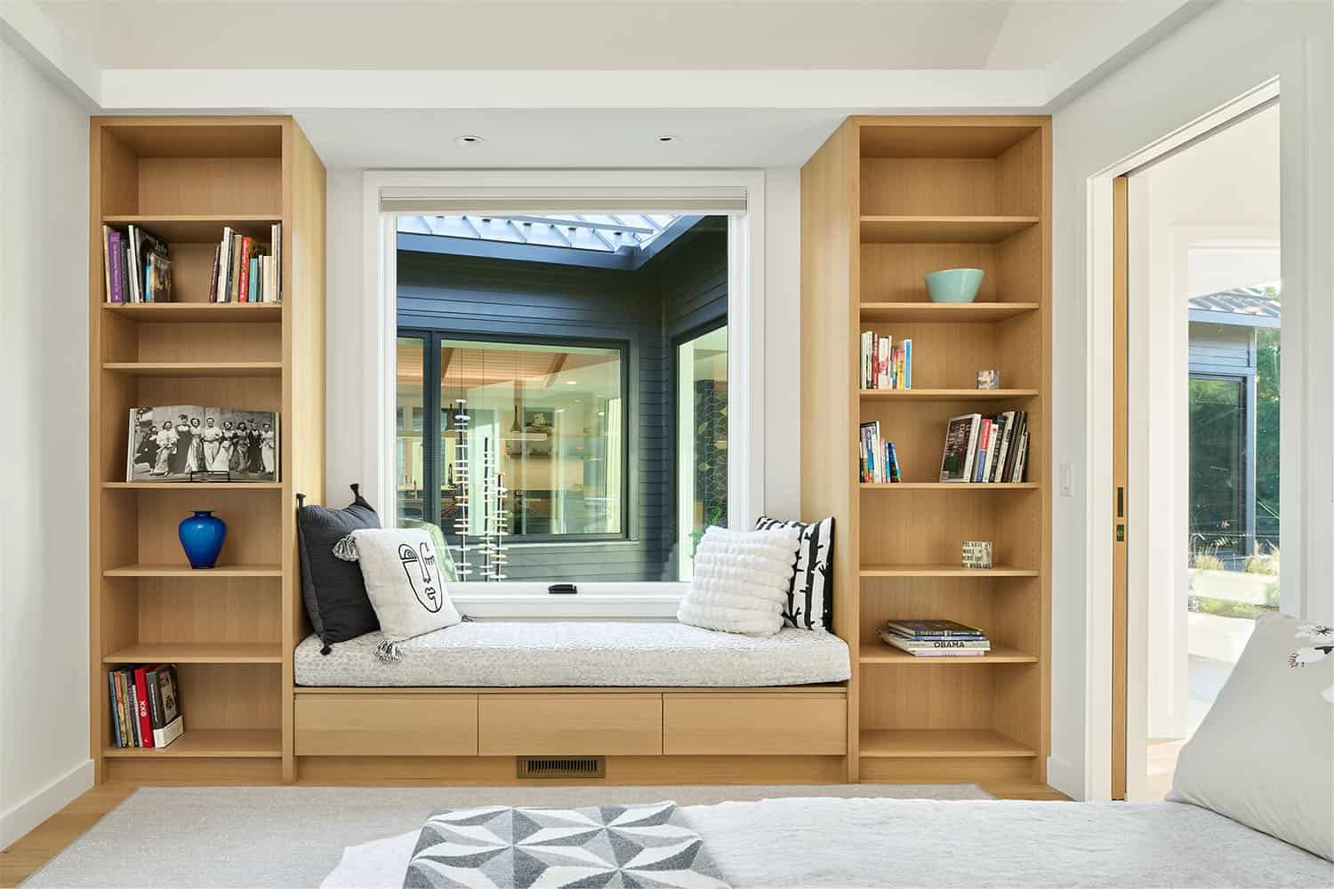 modern bedroom with a built-in window seat